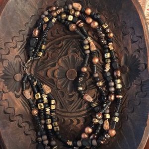 Layered beaded necklace - four strands